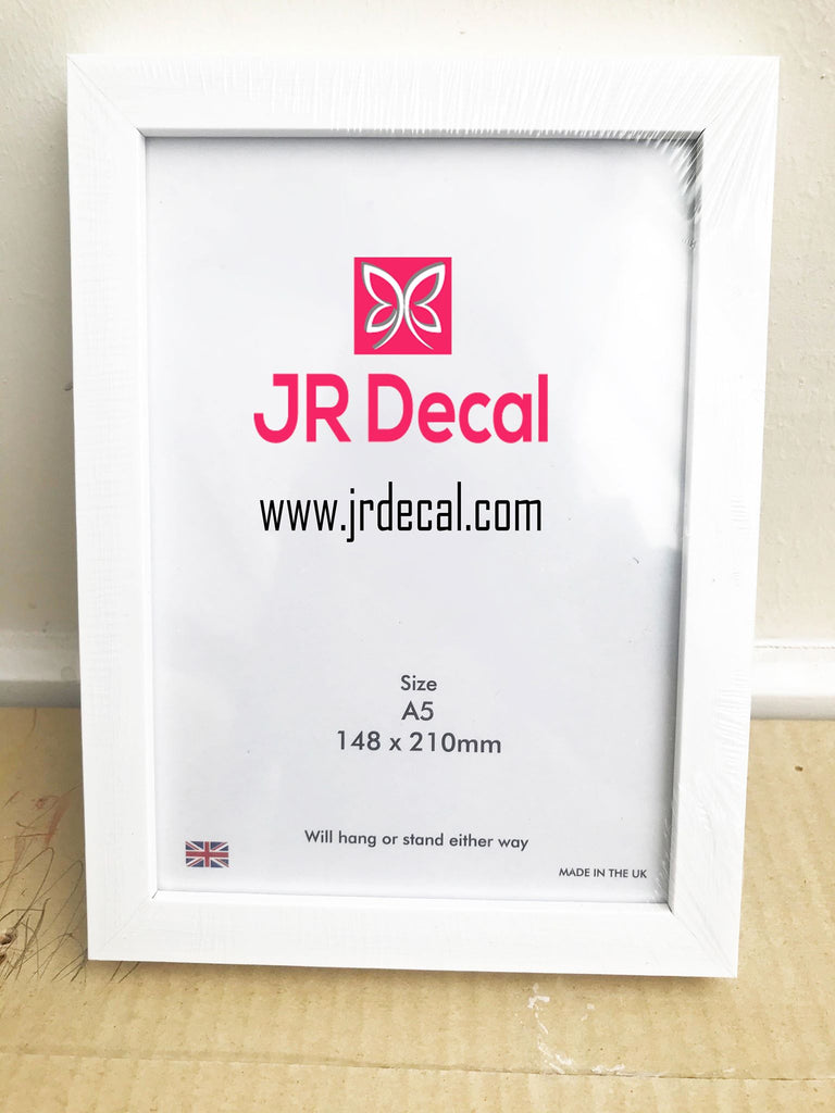 a white picture frame with a red j r decal logo